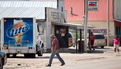 A beer truck in front of a liquor store in Whiteclay NE