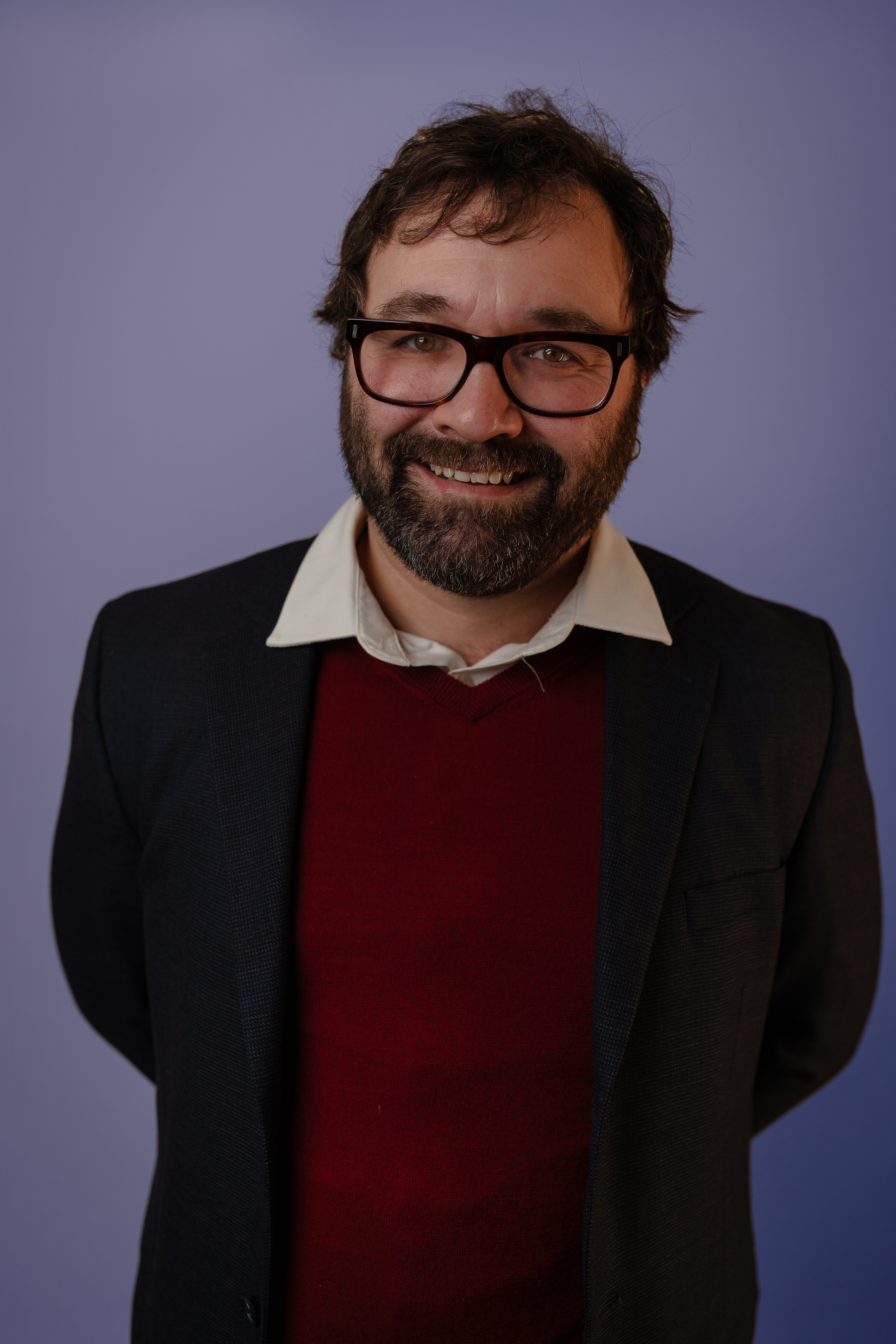 Alcohol Justice Research Director Carson Benowitz-Fredericks looking like the doofus who just assigned a bunch of overbaked adverbs to his coworkers