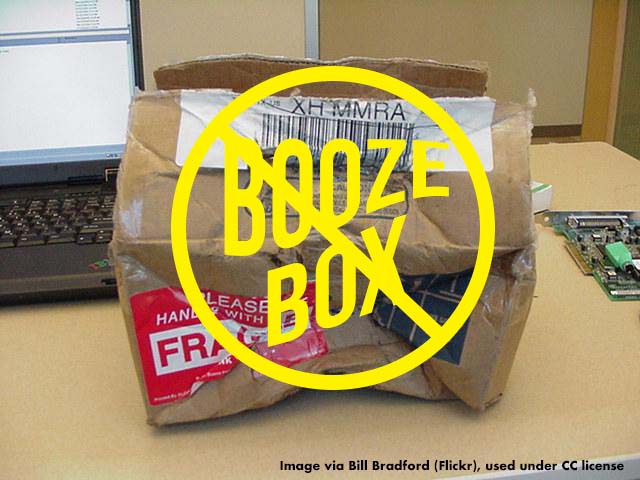 a crushed delivery box with "booze box" printed over it then crossed out