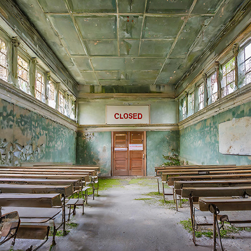 an ai generated image of an abandoned classroom-like building, covered in green rust