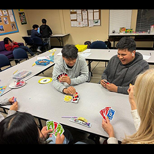 YFJ playing uno cards